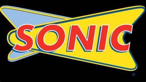 A yellow and red sonic logo on a black background