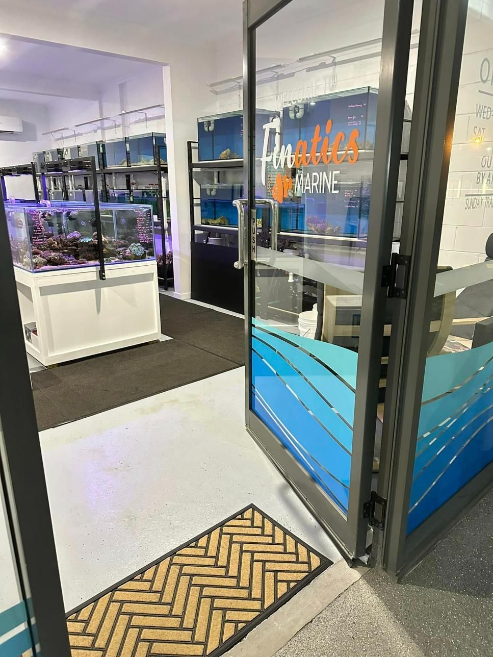 A Store With a Door Open and a Mat on the Floor — Finatics Marine in Macquarie, NSW