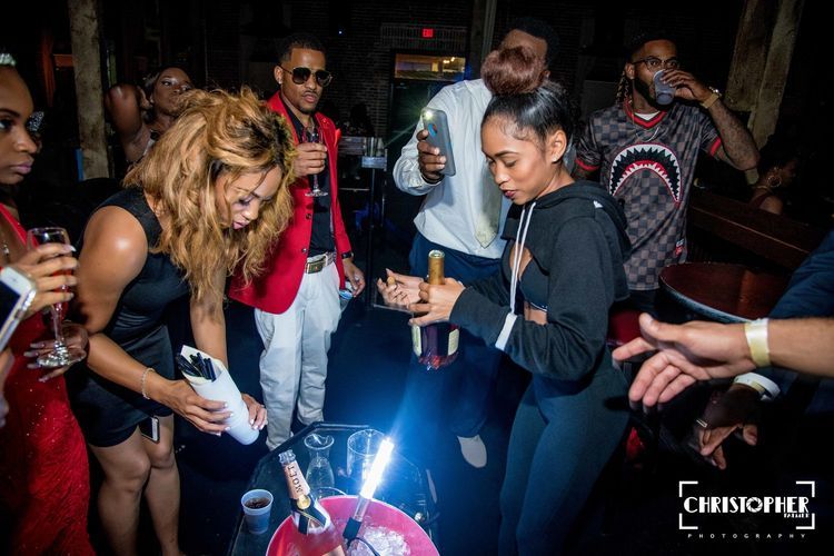 people drinking & having fun at the party