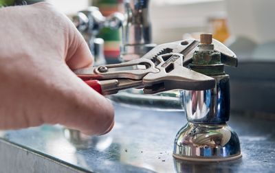 Plumber Holding Wrench — Truckee, CA — Lakeview Plumbing Company