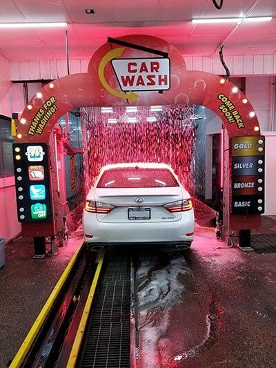White car in the car wash — Commercial Fleet Washing in Albany,NY