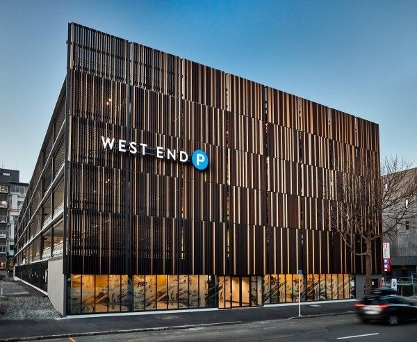 A large building with a sign that says west end p