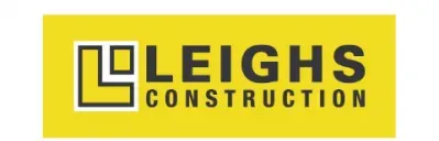 A yellow sign that says leighs construction on it