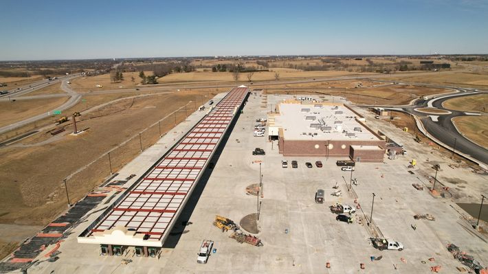 An aerial view of a large building under construction