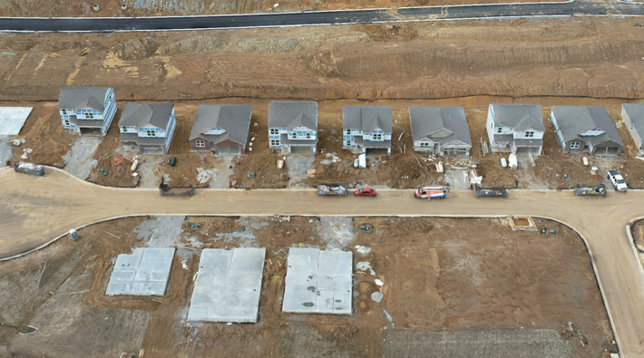 An aerial view of a residential neighborhood under construction