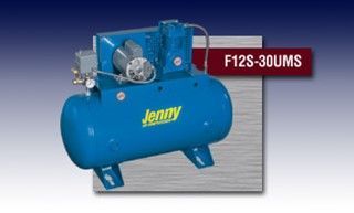A blue jenny air compressor is sitting on a table