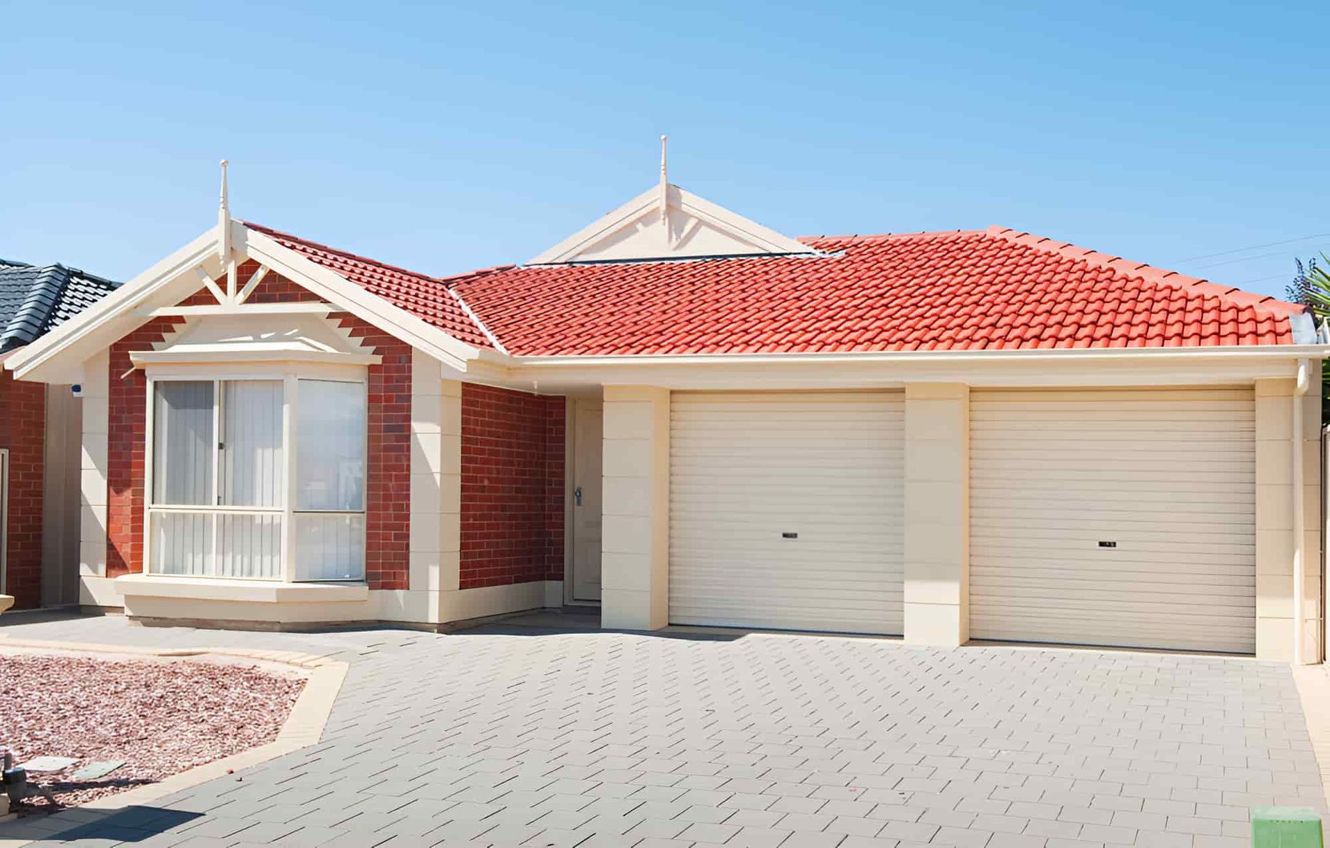 A Small House With A Porch And A Fence In Front Of It — McGrath Builders & Associates In Lavington, NSW