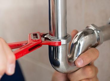Water Leaks — Plumber Fixing Pipe in McDonough, GA
