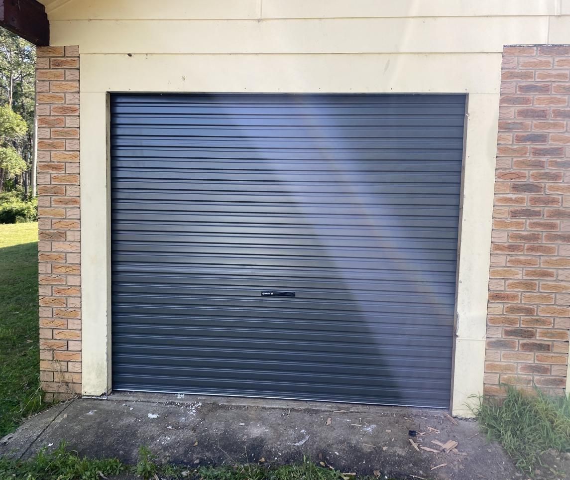 A Black Garage Door — P & D Garage Doors in Taree, NSW