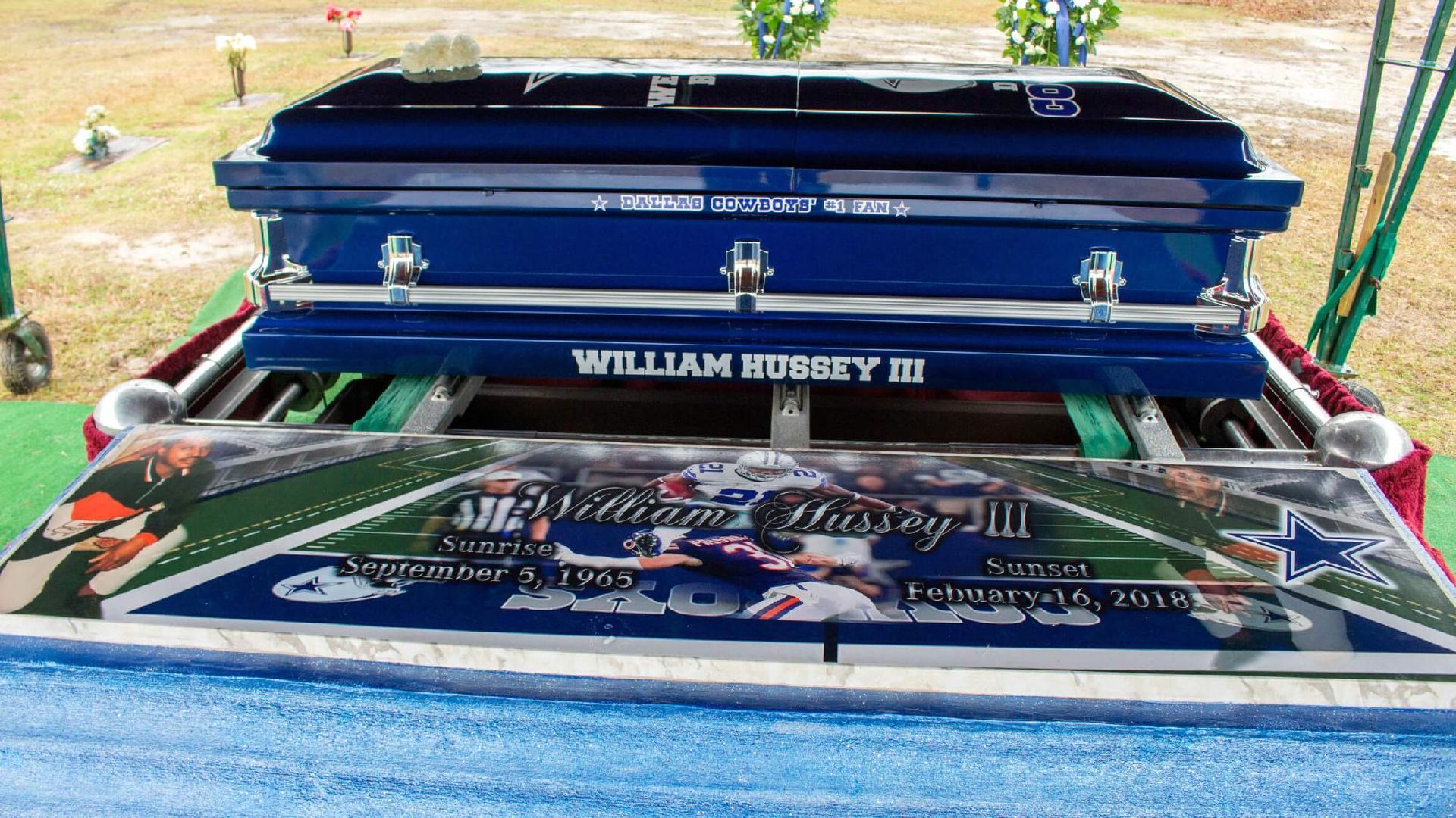 Blue casket with football field design, 