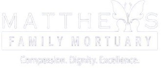 Matthews Family Mortuary logo with a butterfly symbol. "Compassion. Dignity. Excellence." below.