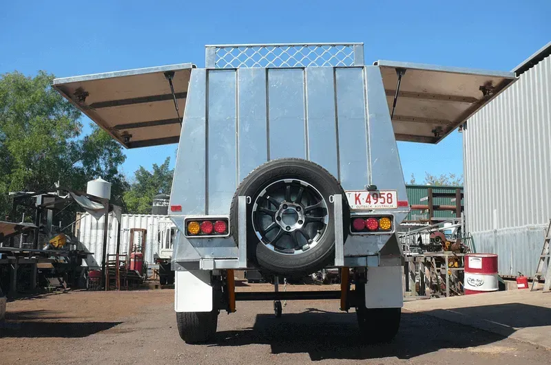 Rear View of a Silver Trailer With Two Open Side Doors — Greville Fabrication in Girraween, NSW