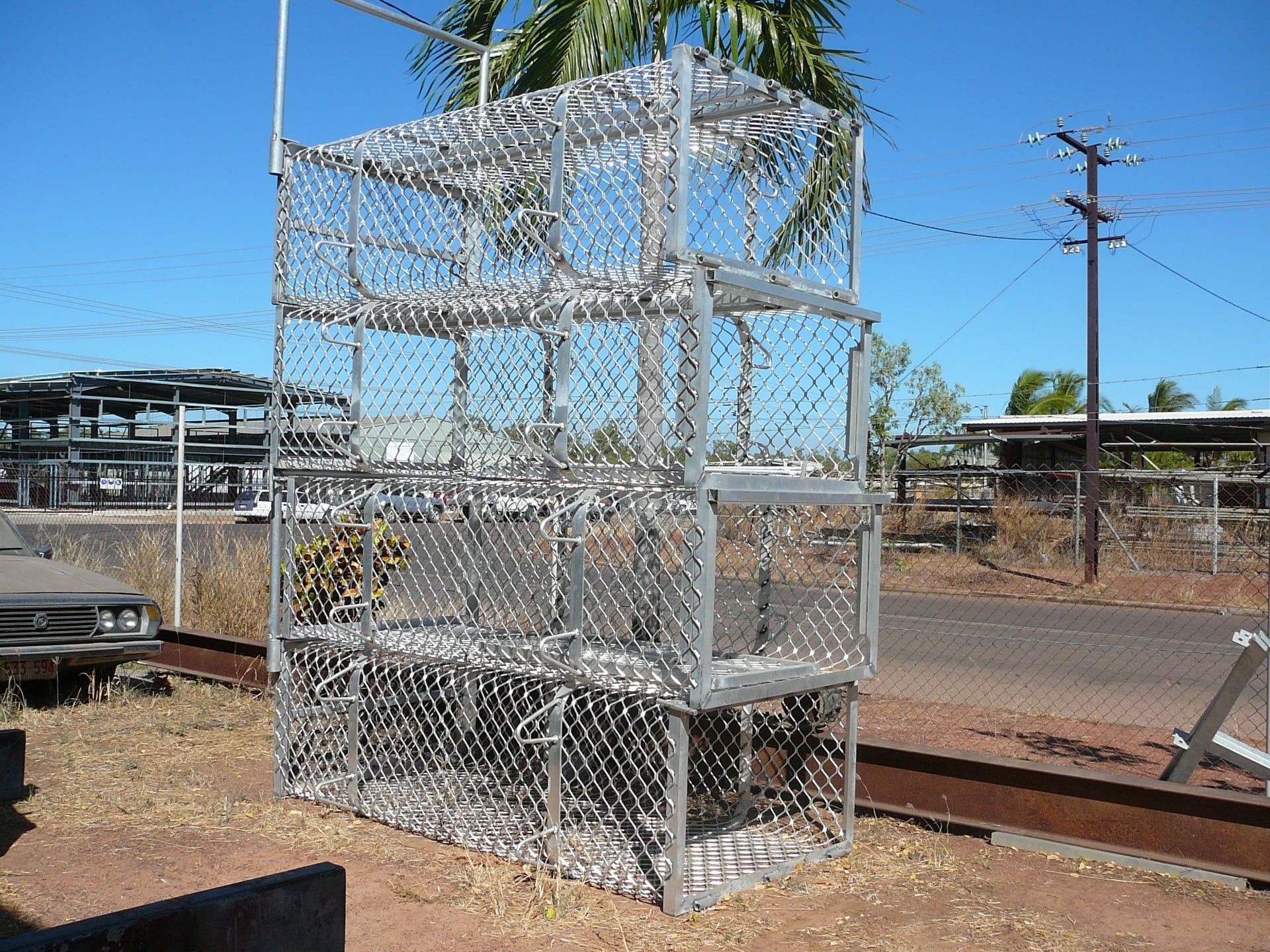 A Stack of Three Large, Metal Crab Traps in an Outdoor Setting — Greville Fabrication in Girraween, NSW