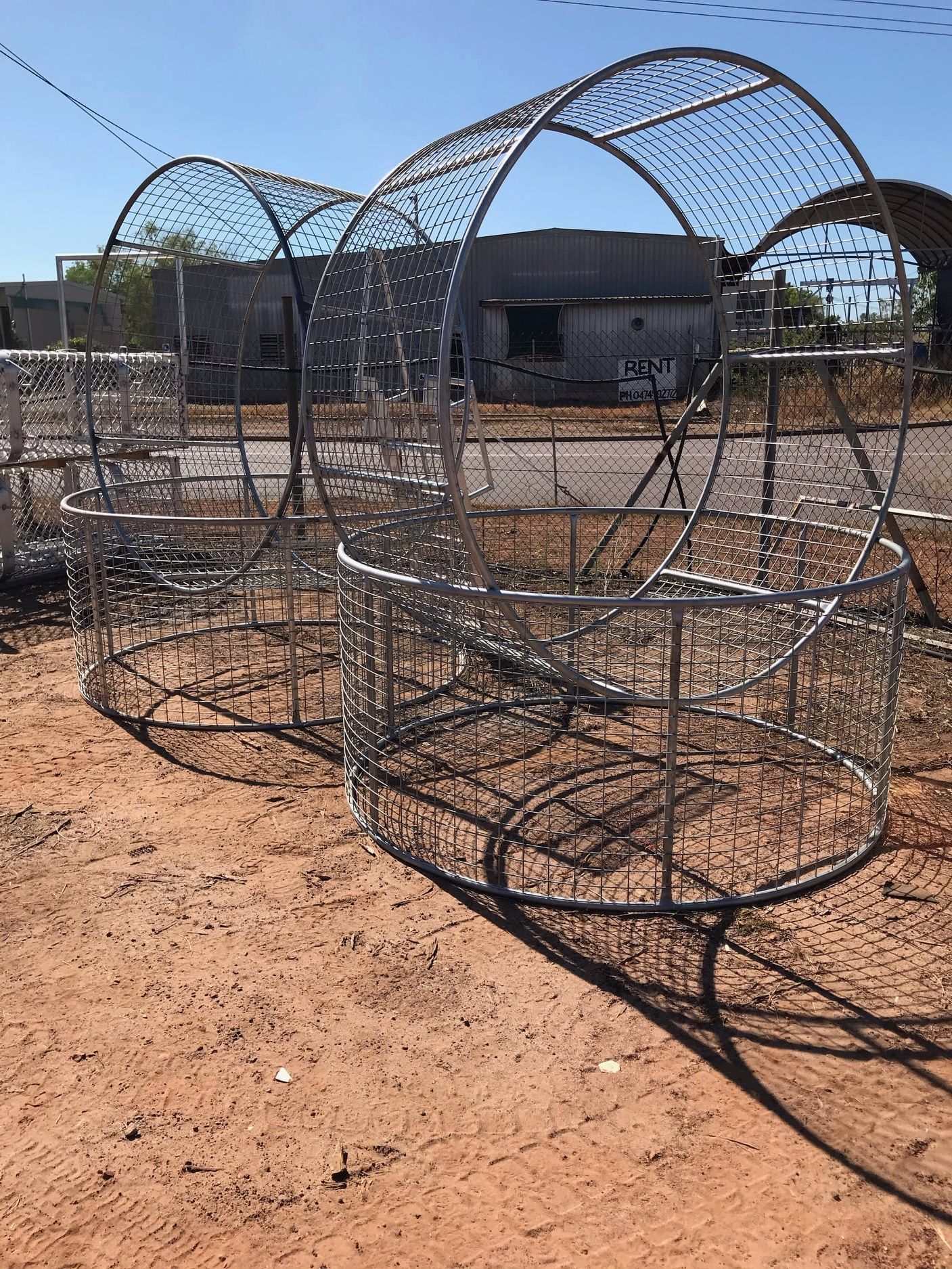 Metal Archway Structures Sit on Dirt — Greville Fabrication in Girraween, NSW