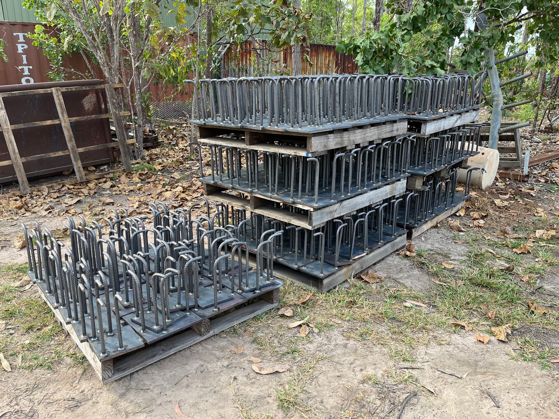 Rows of Metal U-bolts Mounted on Steel Plates, Organized on Wooden Pallets — Greville Fabrication in Girraween, NSW