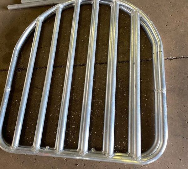 Metal Hay Feeder, Silver Bars Arranged in a Semi-circle Shape — Greville Fabrication in Girraween, NSW