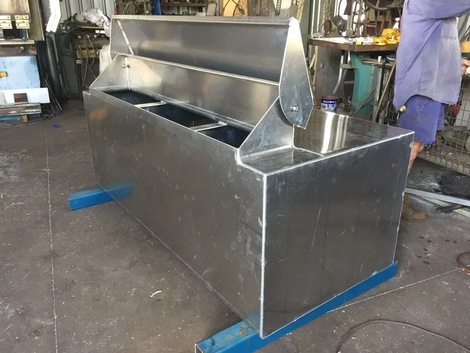 A Steel Cabinet With Swing Cover in A Workshop — Greville Fabrication in Girraween, NSW
