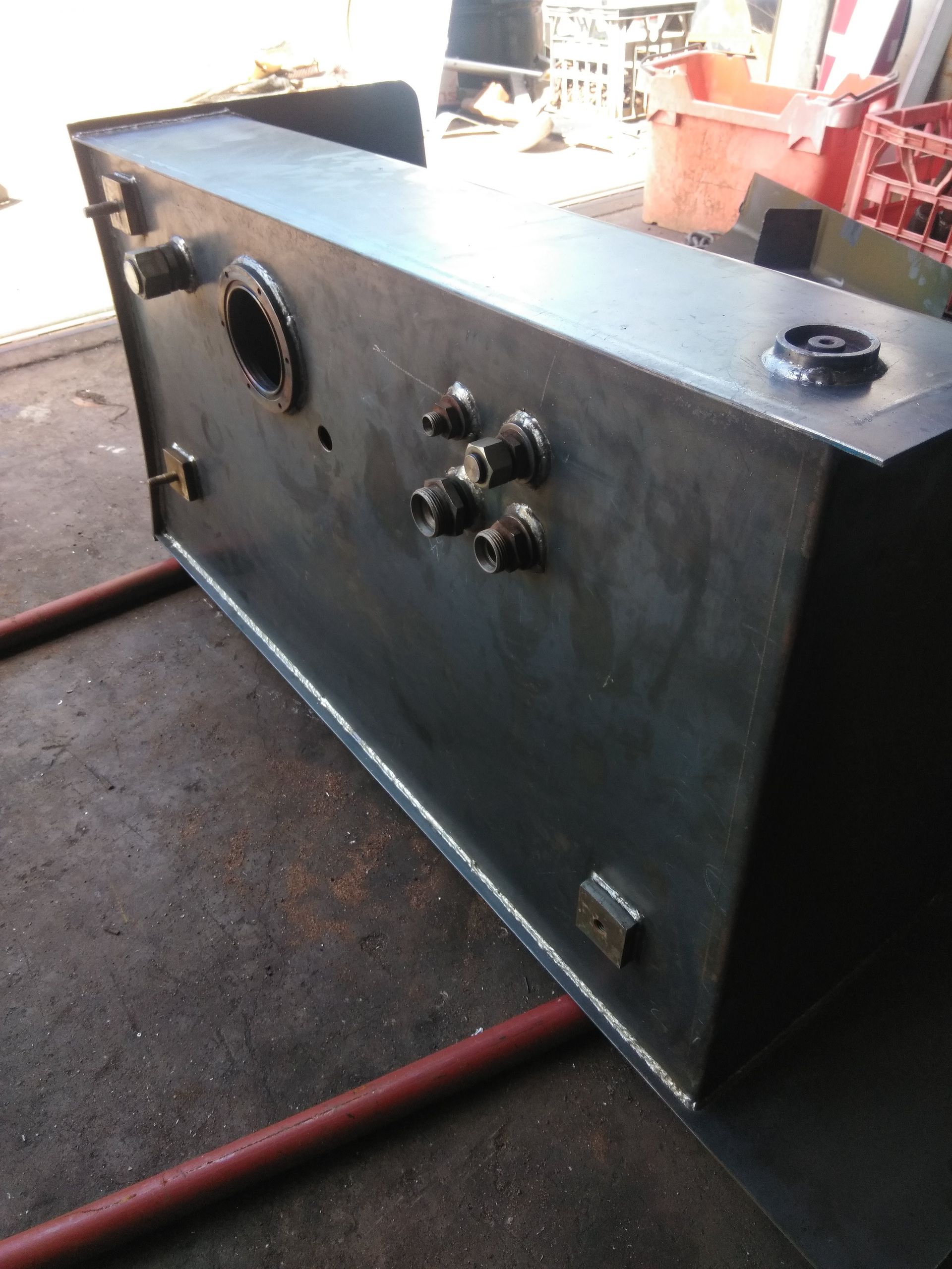 Metal Equipment Box With Pipes and Fittings on a Workshop Floor — Greville Fabrication in Girraween, NSW
