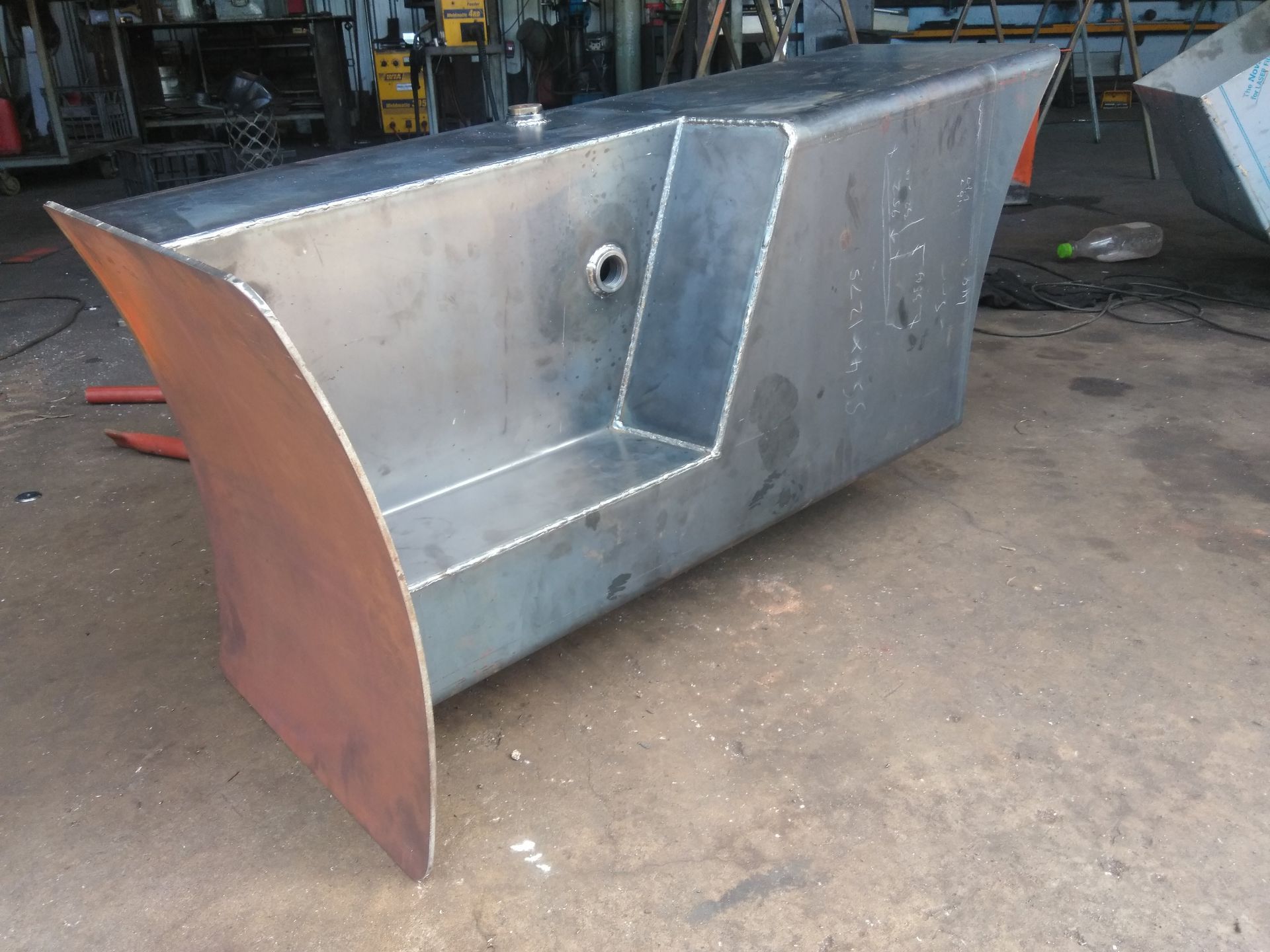 Large Silver Metal Industrial Container or Hopper With a Curved Red End — Greville Fabrication in Girraween, NSW