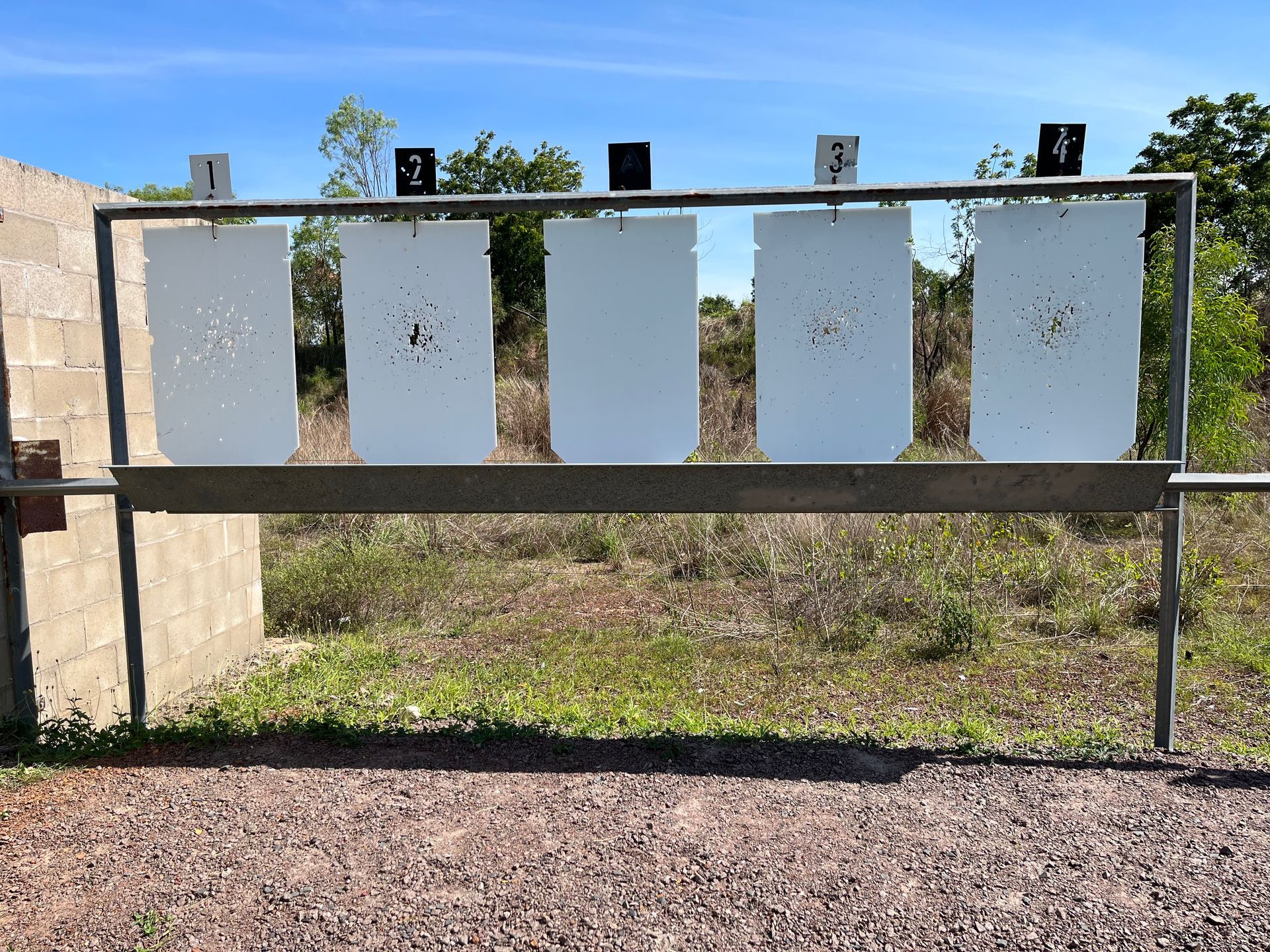 Shooting range targets with bullet holes, outdoors on a sunny day — Greville Fabrication in Girraween, NSW
