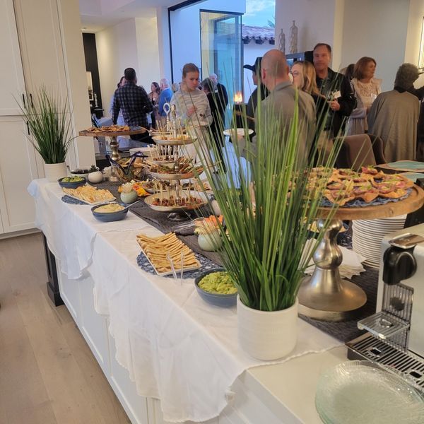 A buffet table with a lot of food on it