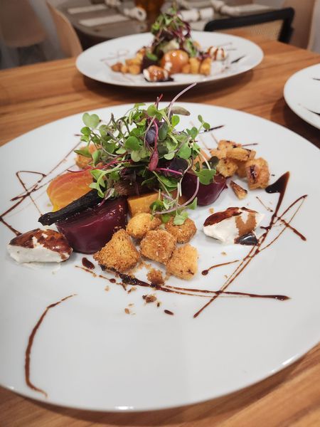 A close up of a plate of food on a table