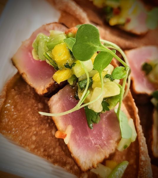 A close up of a plate of food with meat and vegetables