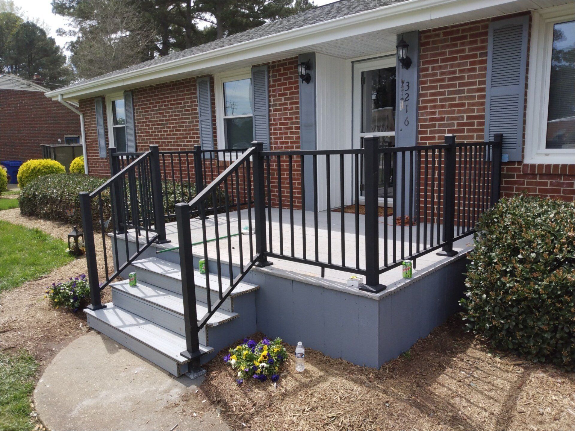Porch railings installed and painted