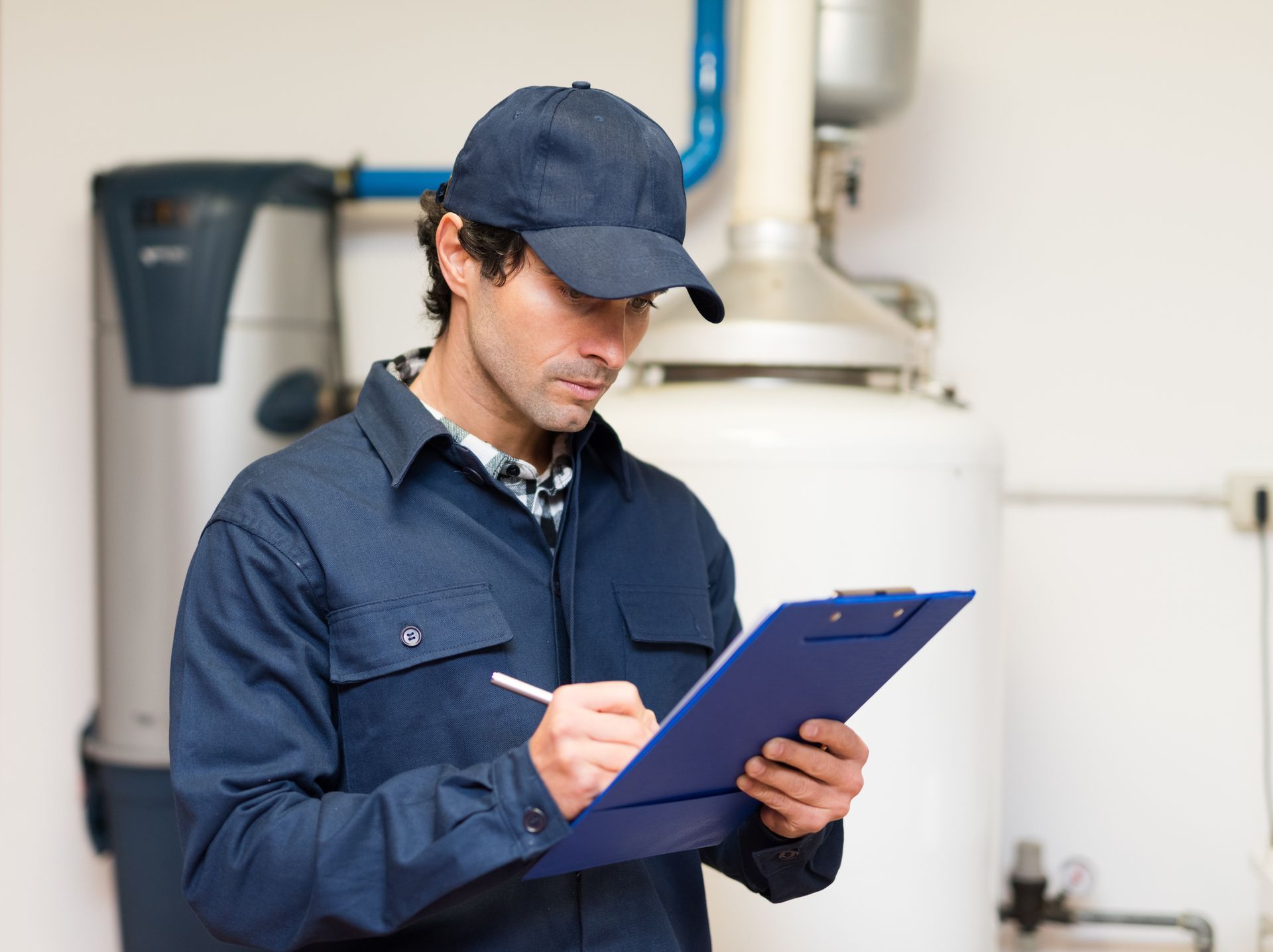 Professional plumber portrait showcasing reliable heating contractor experience and quality work.