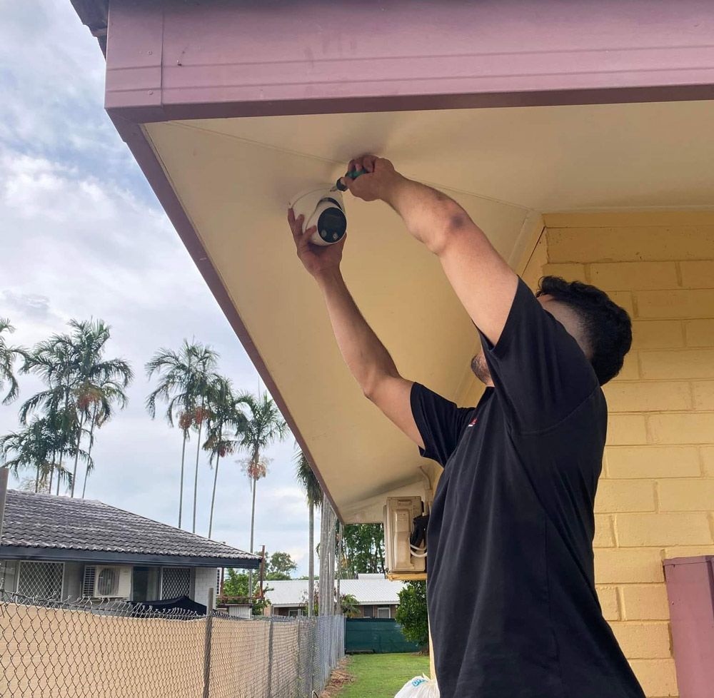 Man Installing CCTV
