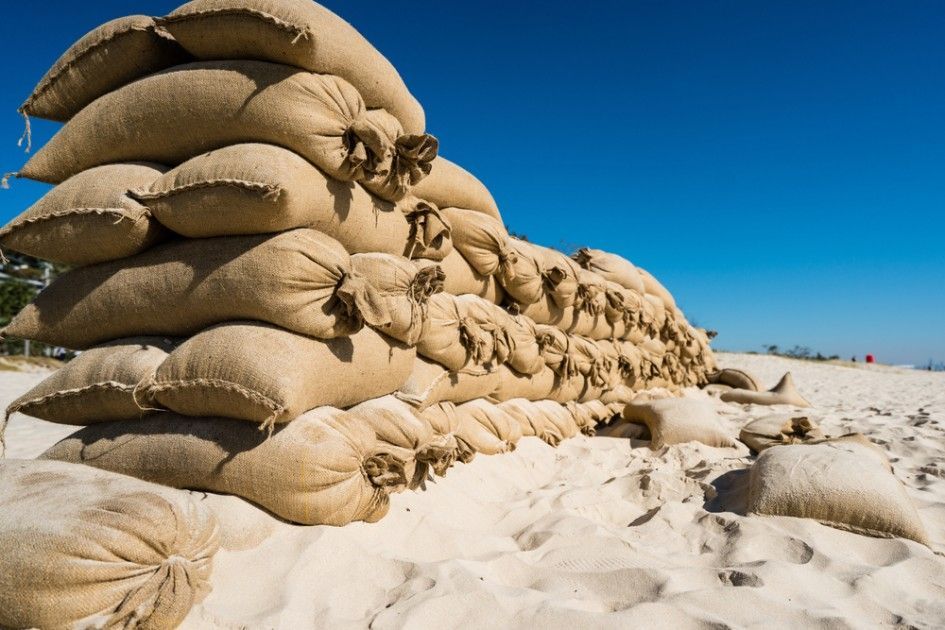 A Pile of Sandbags Are Stacked on Top of Each Other — Payton Civil Products in Wilsonton, QLD