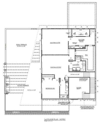 Plano de planta que muestra la distribución de una casa, incluido un garaje, áreas de estar y dormitorios.
