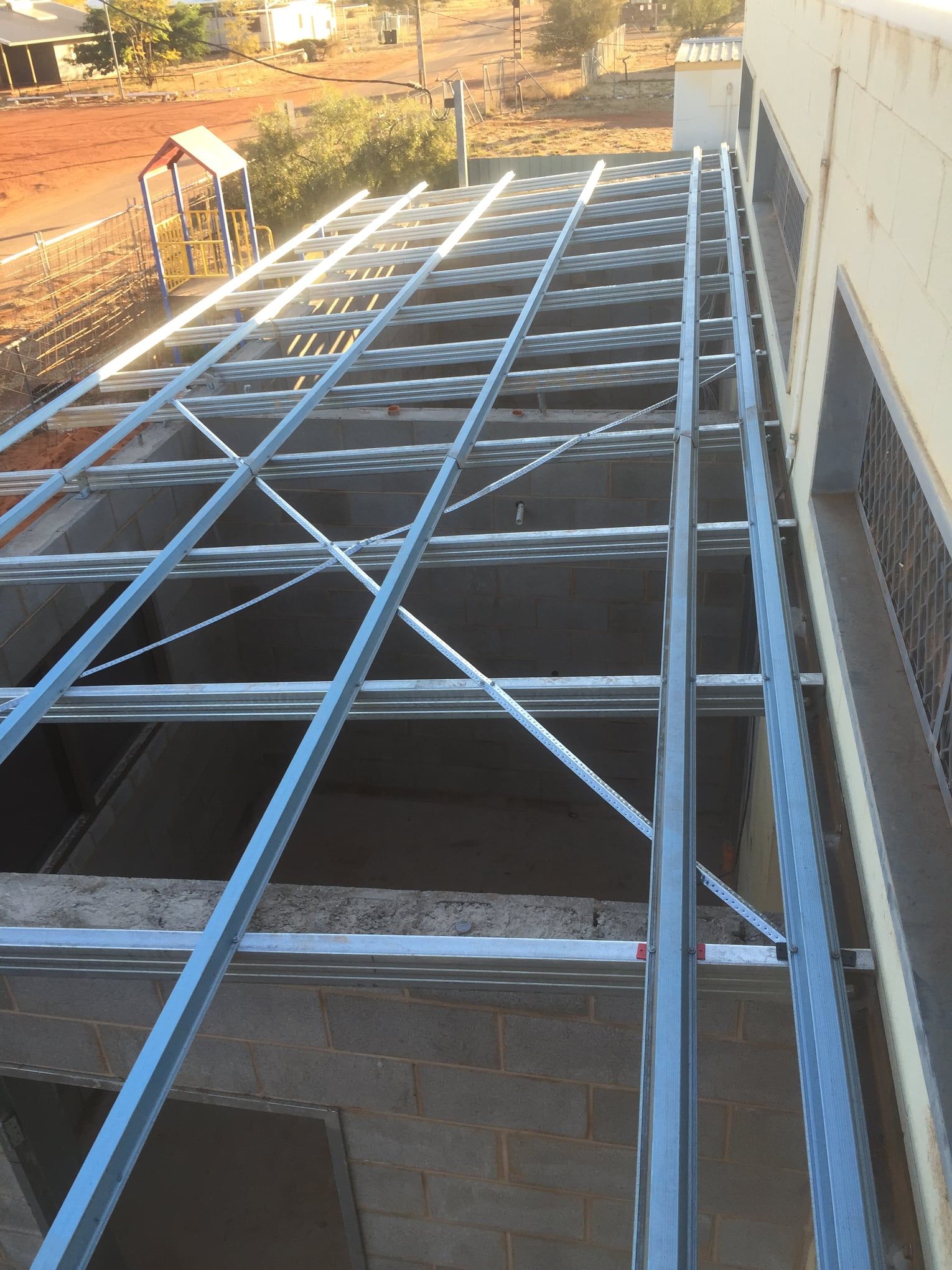 A Metal Structure Is Being Built On The Side Of A Building β Bullant Building In Ciccone, NT