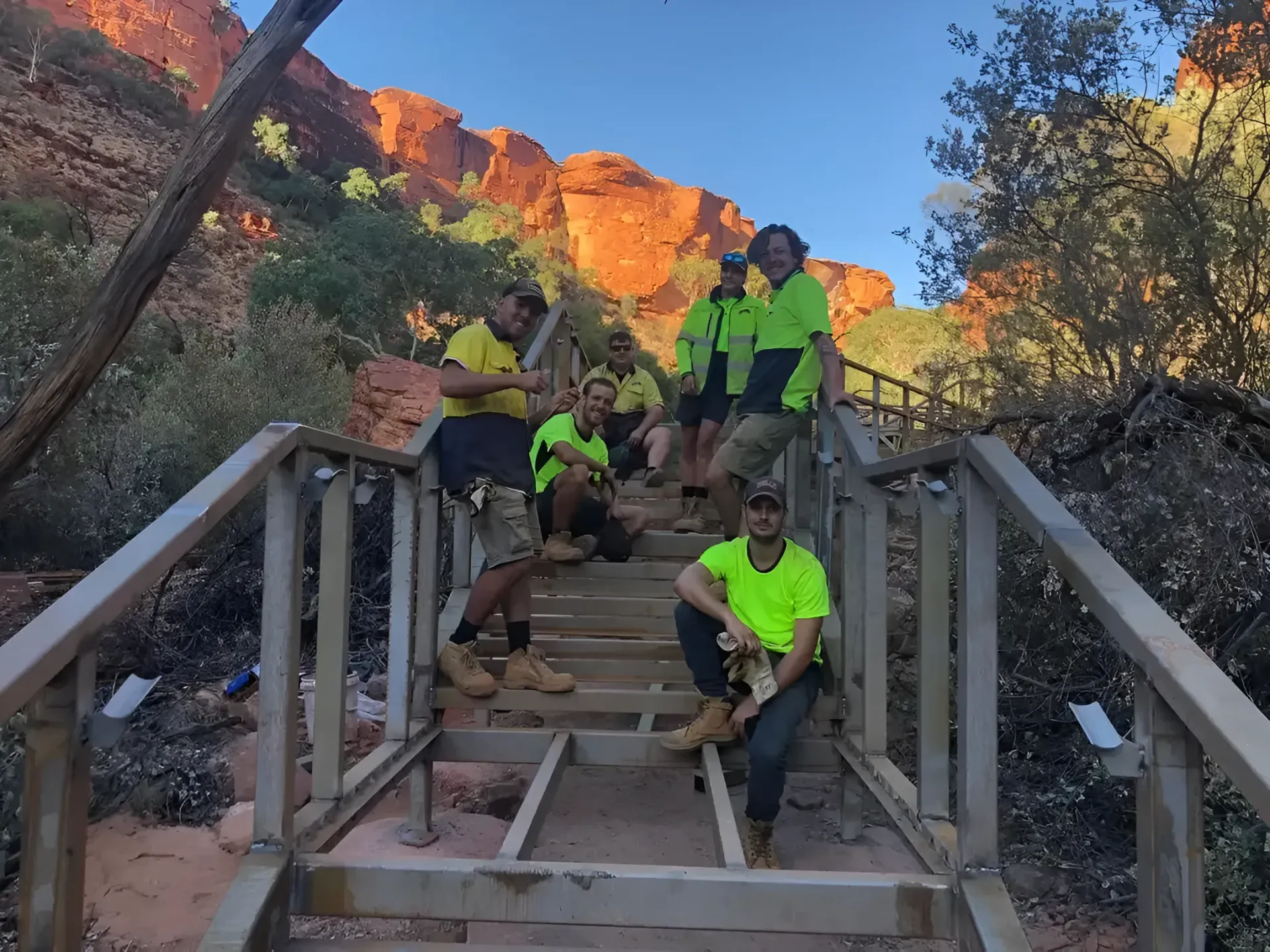 A Group Of People Are Posing — Bullant Building In Ciccone, NT