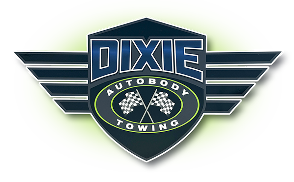A dixie autobody towing logo on a white background