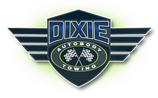 A dixie autobody towing logo with a checkered flag