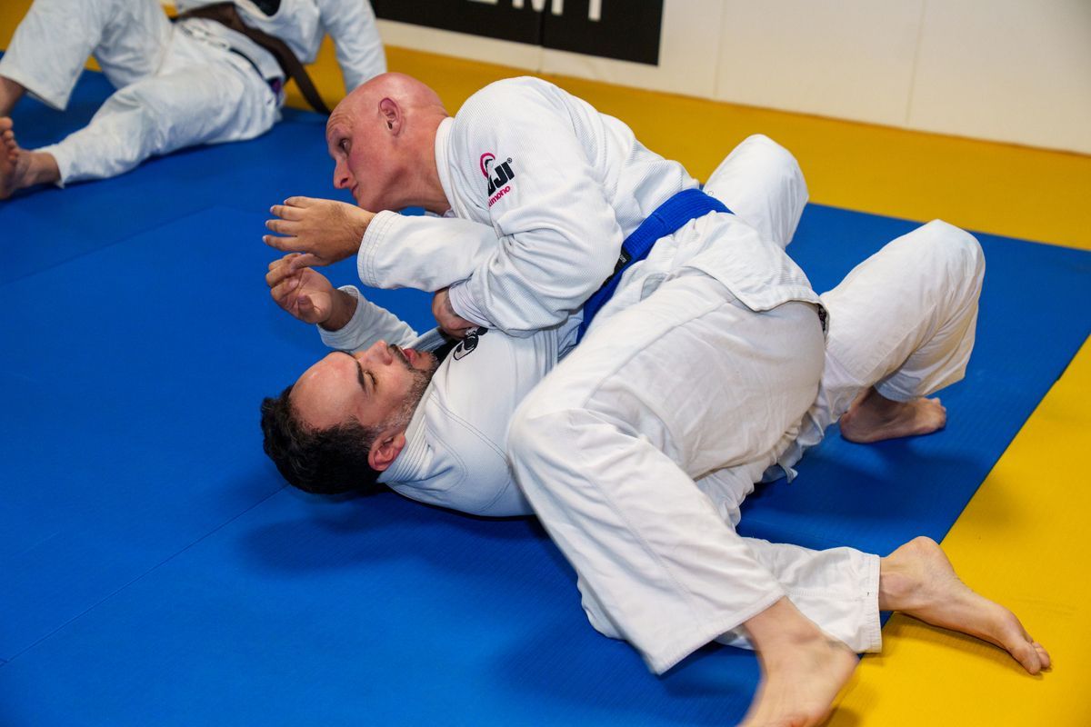 Adults training Brazilian Jiu-Jitsu at Inverted Gear Academy in Bethlehem, PA, building fitness and resilience