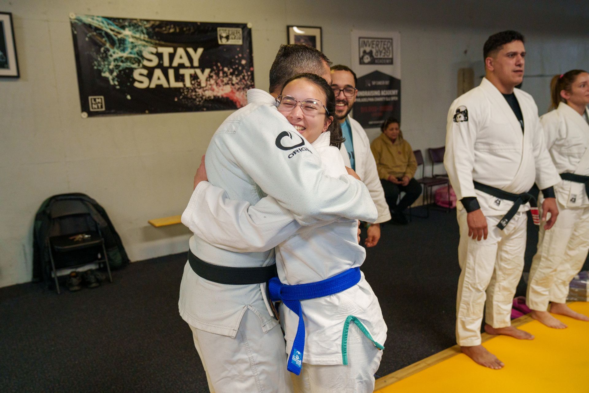 Adults drilling Brazilian Jiu Jitsu techniques at Inverted Gear Academy in Bethlehem, PA to build skills and friendships.
