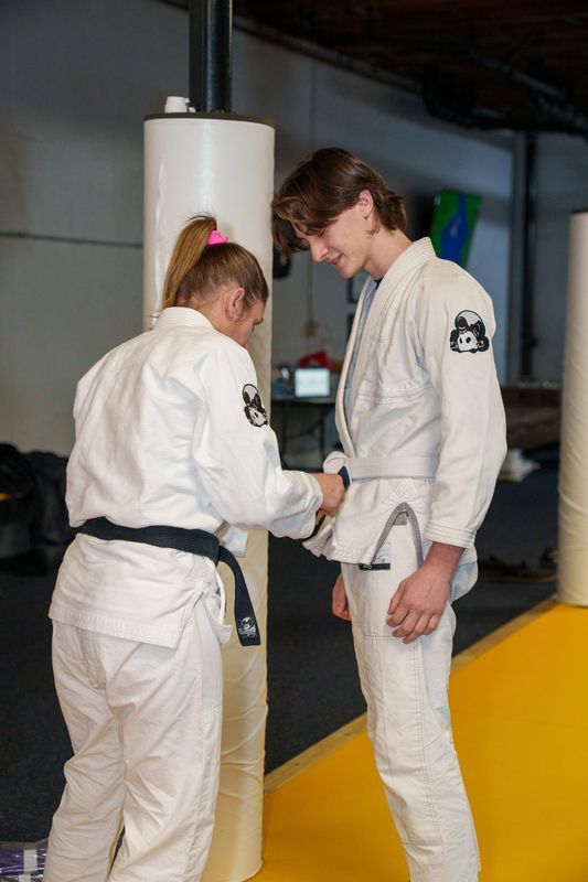Adults practicing Brazilian jiu jitsu drills at Inverted Gear Academy in Bethlehem, PA, building fitness and confidence.