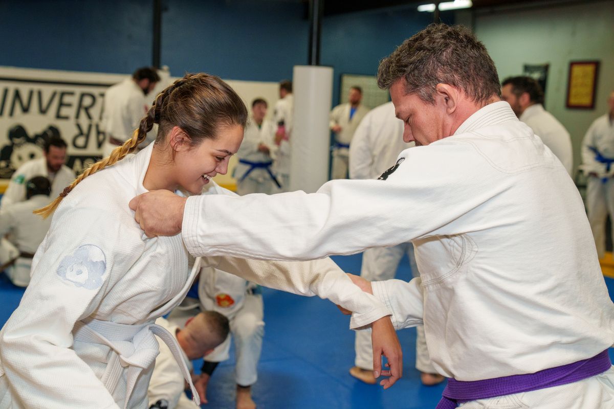 Beginners drilling grappling basics at Inverted Gear Academy in Bethlehem, PA to build confidence and fitness.