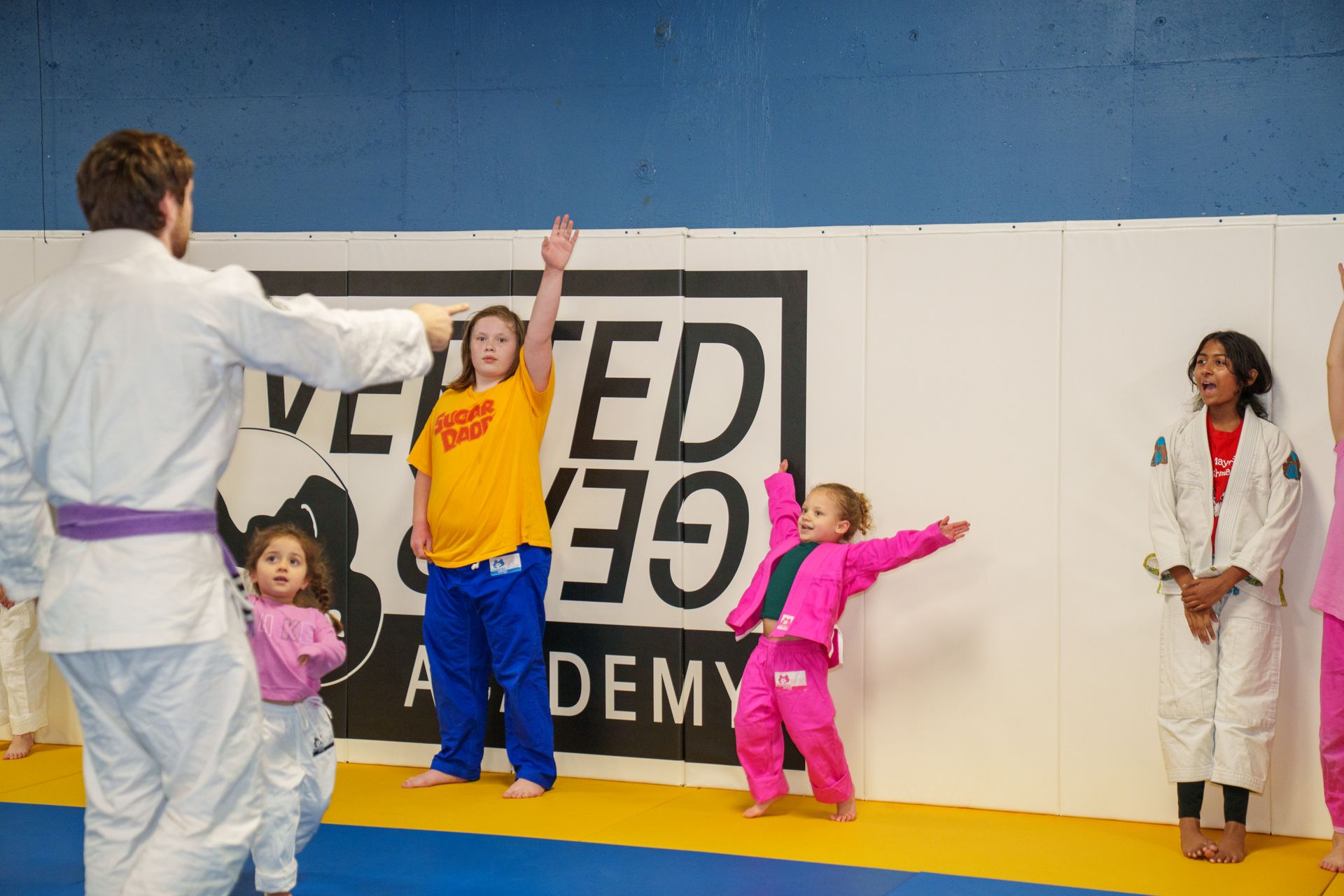 Family training brazilian jiu jitsu together at Inverted Gear Academy in Bethlehem, PA for fitness.