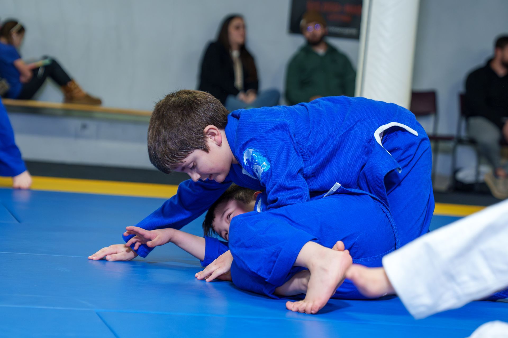 Kids and adults drilling Jiu Jitsu at Inverted Gear Academy in Bethlehem, PA, building skill fast.