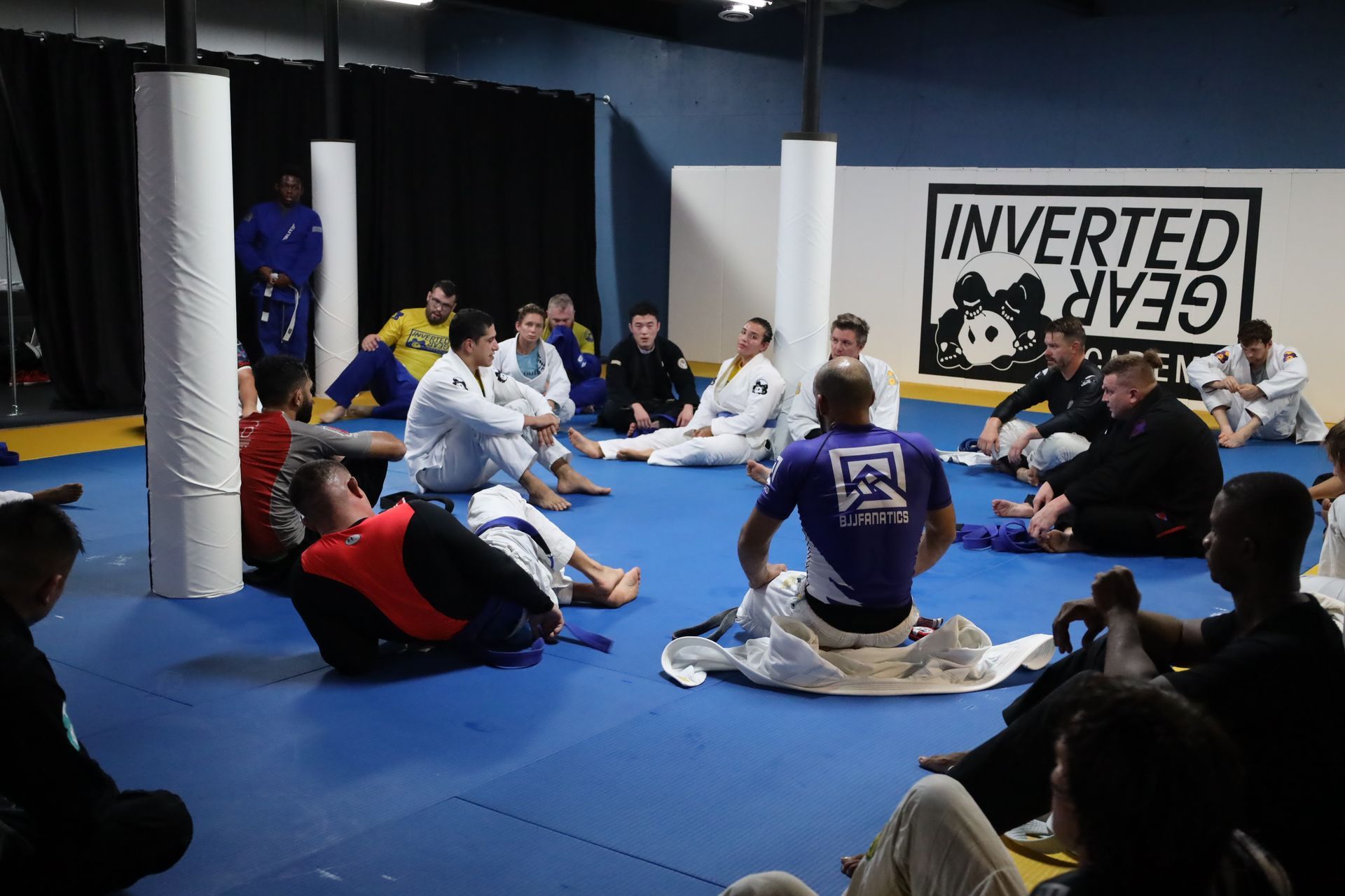 Students practicing jiu-jitsu techniques at Inverted Gear Academy during beginner class in Bethlehem Pennsylvania