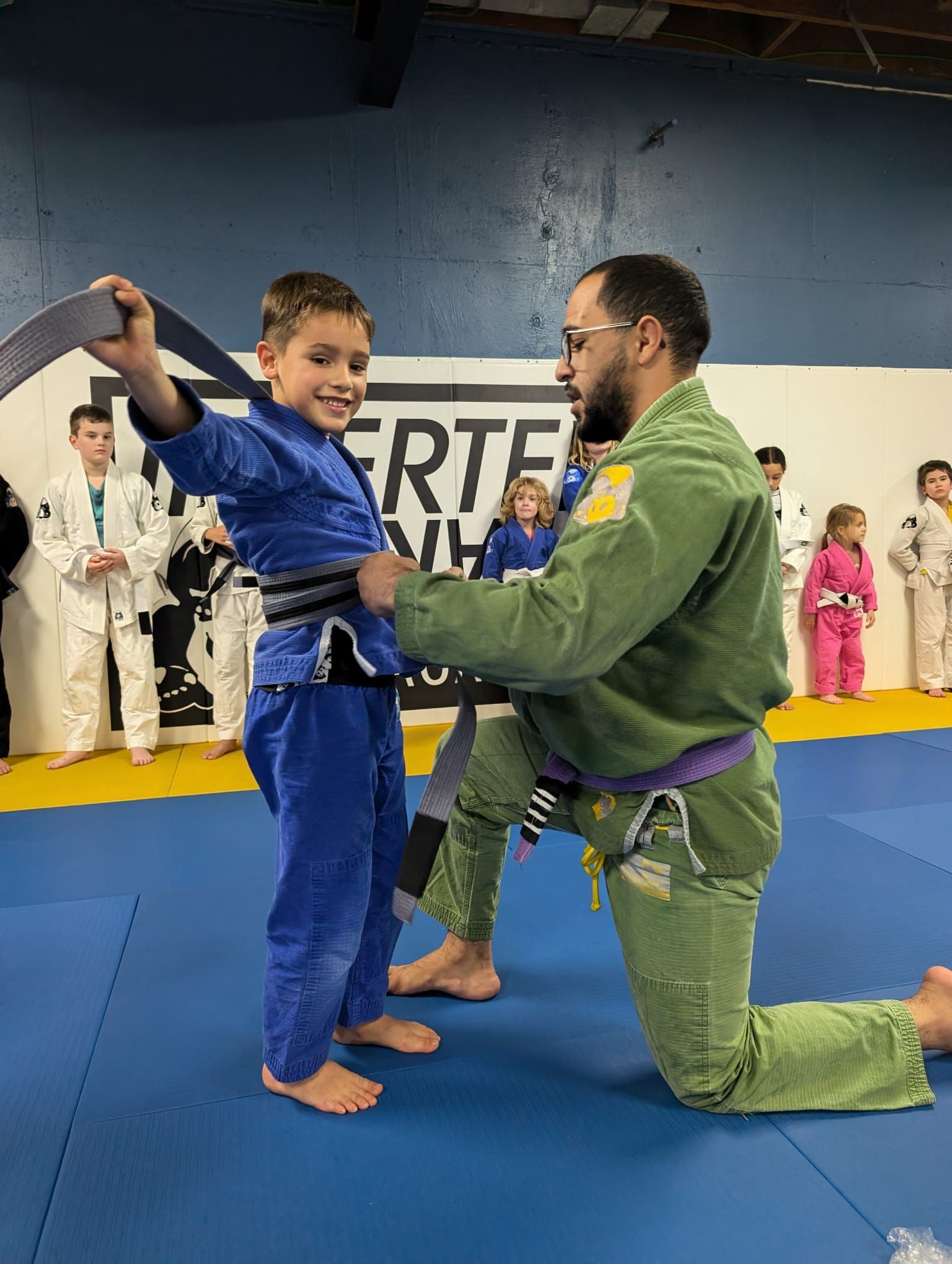 Children practicing Brazilian jiu-jitsu techniques at Inverted Gear Academy in Bethlehem PA building confidence