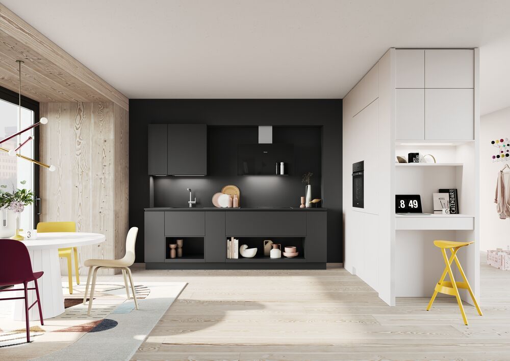 cucina nera con tavolo bianco