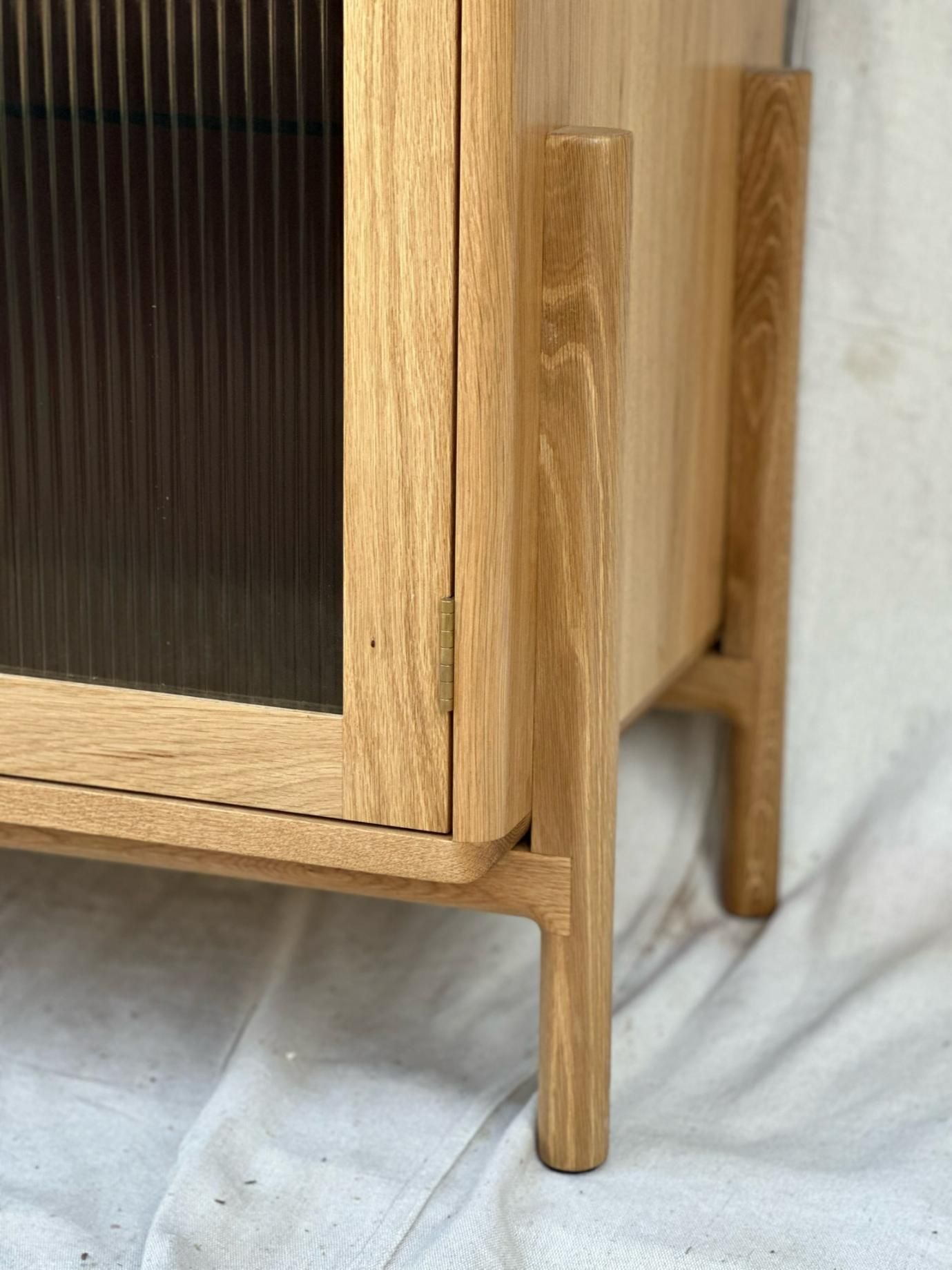 A Close Up Of A Wooden Cabinet With A Glass Door — BC Customs in Burrell Creek, NSW