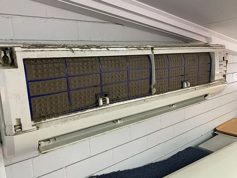 The Inside of an Air Conditioner is Dirty and Needs to Be Cleaned — Northside Air Conditioning Services In Aspley, QLD