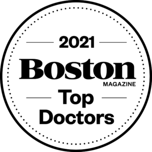 2021 Boston Magazine Top Doctors seal in black and white, with dotted border.