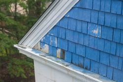 Worn,Wooden,Shake,Siding,On,An,Old,House,In,New