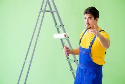 Young,Painter,Doing,Renovation,At,Home